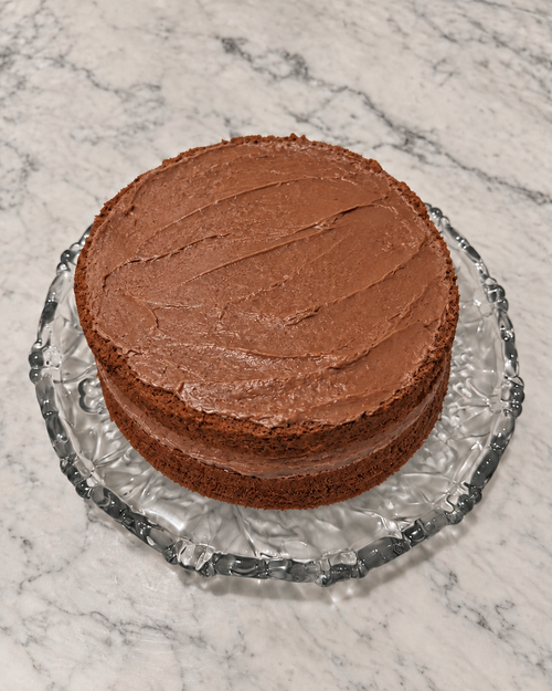 Whole two-layer Cadbury Delight Cake